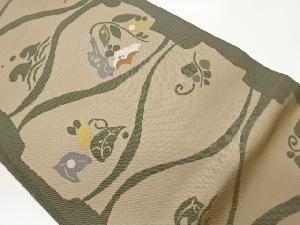 曲線に波・草花模様織出し名古屋帯